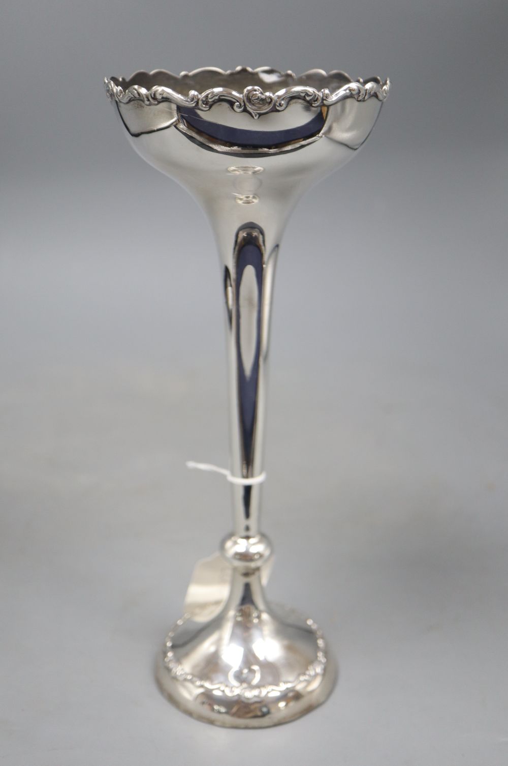 An Edwardian large silver trumpet shaped posy vase, Horace Woodward & Co, London, 1902, height 25.2cm, weighted.